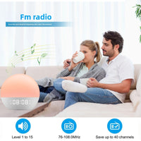 The rising sun's light wakes up the bedside lamp