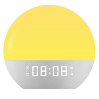 The rising sun's light wakes up the bedside lamp